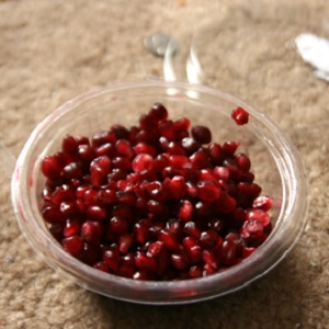 Pomegranate Seeds in Glass Bowl.