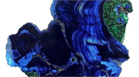 A cross-section of an Azurite Malachite stone. • Azurite Meaning and Uses
