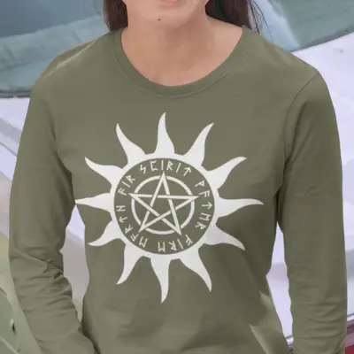 A military green long sleeve tee with a pentacle graphic encircled by sun rays and elder futhark runes.