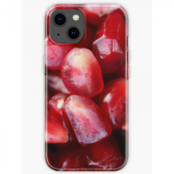 Close up of an iPhone 13 decorated with our Pomegranate Seeds soft phone case.