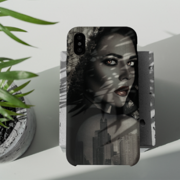 An iPhone 11 case designed with a bewitching woman, leaning up against a granite slab near a plant.
