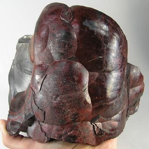 A rounded, lustrous gray-black kidney ore hematite specimen.
