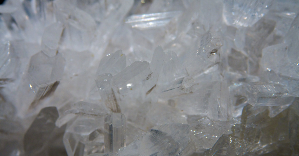 A close-up view of a cluster of selenite crystals.