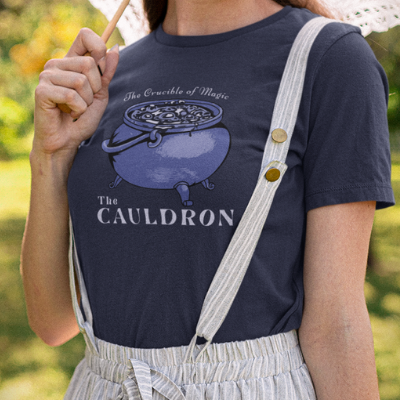 A woman wearing a Navy Blue Cauldron Tee from Elune Blue on Etsy.