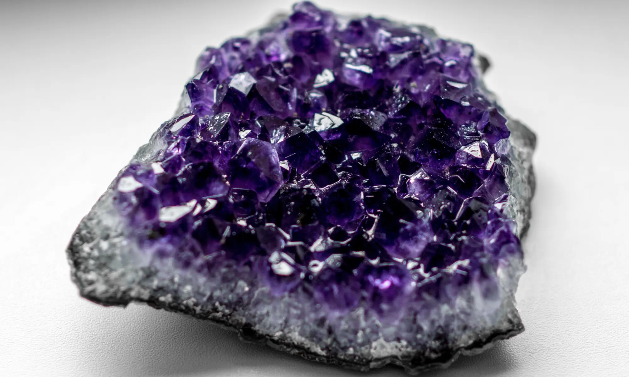 Close-up of a purple amethyst crystal.