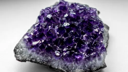 Close-up of a purple amethyst crystal.